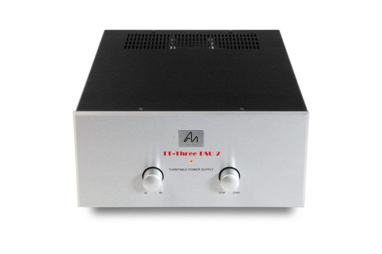 Schwarzes und silbernes Netzteil mit zwei Bedienelementen und roten Akzenten.